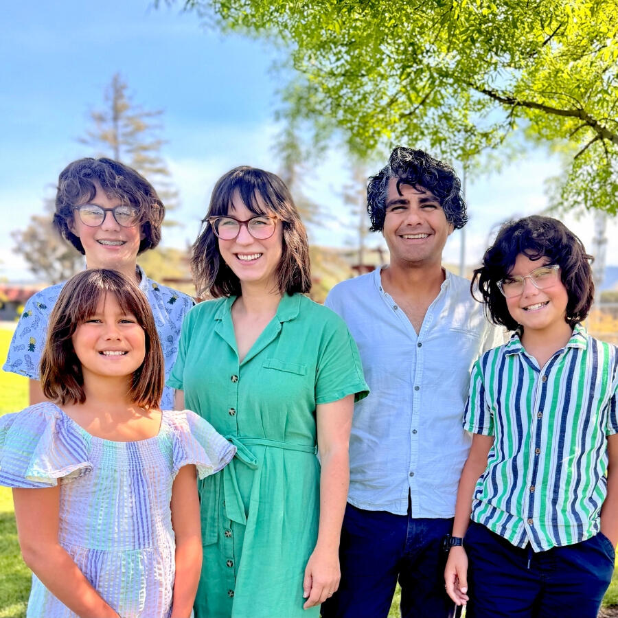 Recent image of Marisa Gomez with her husband and three children